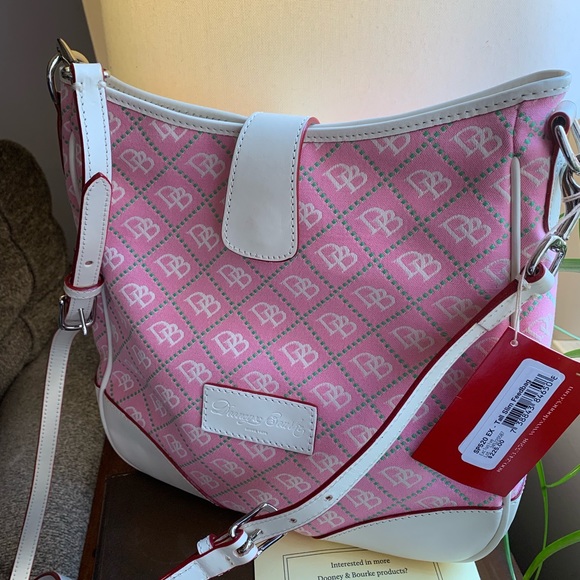 Dooney & Bourke Handbags - Authentic Dooney & Bourke slim leather Canvas Crb